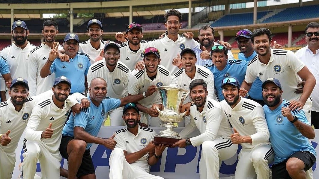 Duleep Trophy winners with the iconic trophy. - Photo: PTI